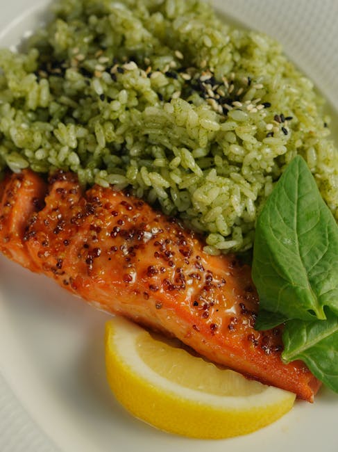 Seared salmon with green rice and lemon